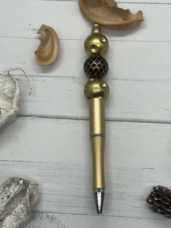 Gold and black  beaded pen