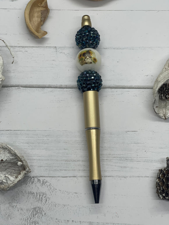 Sunflower and gnome black and gold beaded pen