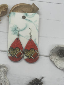 1.6 in red glitter and leopard print football earrings