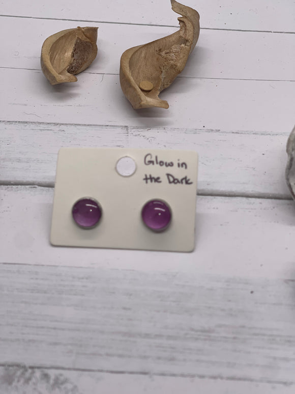 Small glow in the dark purple resin stud earrings